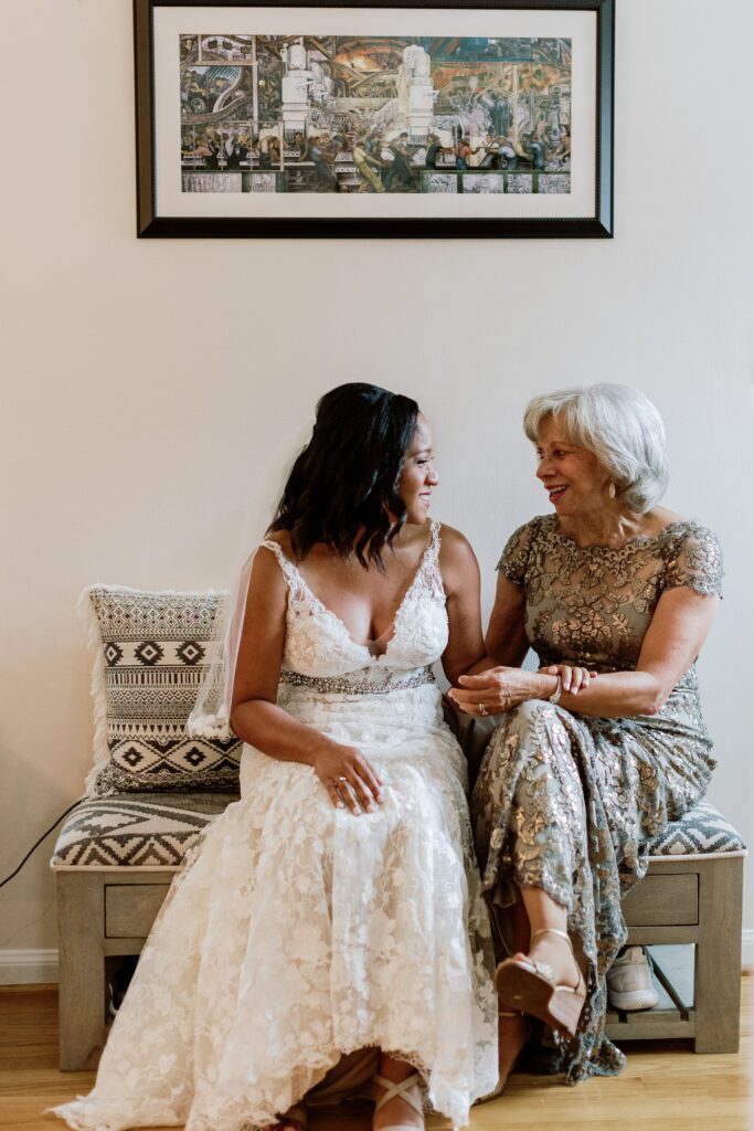 bride with her mom before the wedding ceremony. intimate plymouth backyard wedding